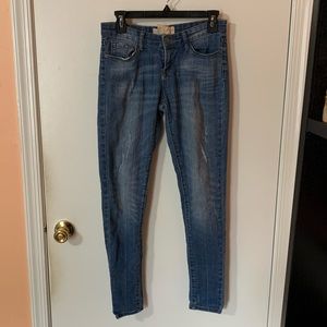 Lightly Distressed Medium Wash Skinny Jeans